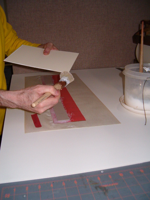 applying bead of pva to bottom board